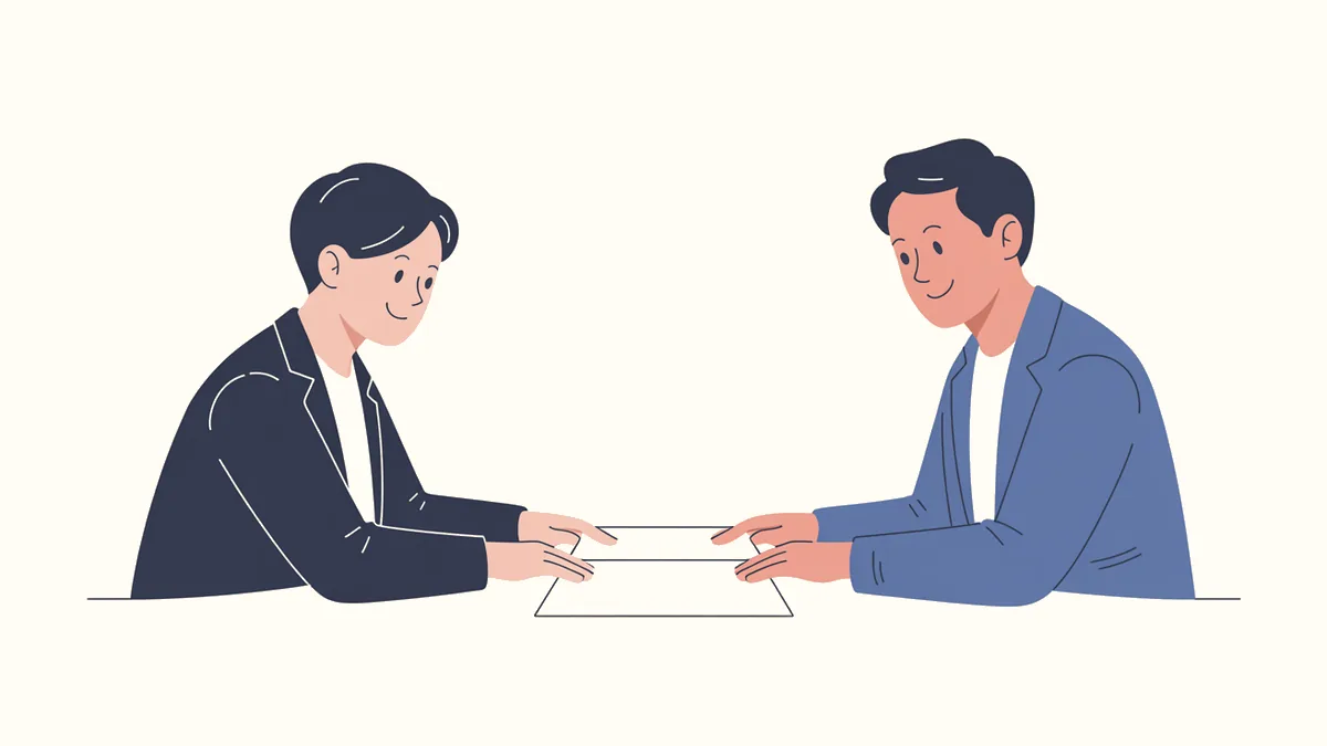 机を挟んで向かい合う2人の人物が、その間に置かれた1枚の書類に手を添えているイラスト